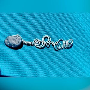 Finger Lakes wire wrapped natural lucky stone.